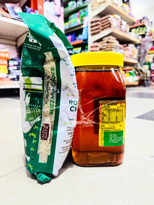 DABUR HONEY 1 KG BOTTLE. (RICE FREE)