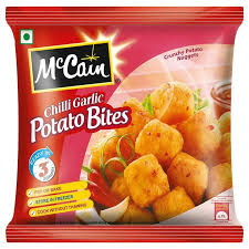 MCCAIN CHILLI GARLIC POTATO BITES 450 GM. POUCH